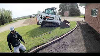 DIY Installing landscape interlock edgers  fabric and river rock around a house Start to Finish [upl. by Simons]