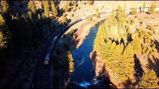 4K Drone Chase Union Pacific Freight Train at Glenshire CA amp Along the Truckee River [upl. by Ytsirhc]