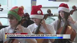 OAJ Airport hosts school music programs to spread holiday cheer [upl. by Ssur]