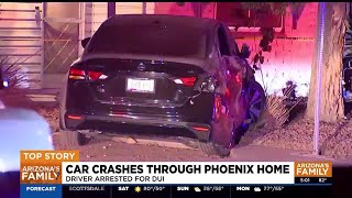 Car crashes into Phoenix home driver arrested for DUI [upl. by Nnaeed]