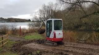 Finding Newts under a path with a Mini Digger Takeuchi TB216 Excavator [upl. by Arriaes123]