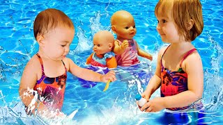 Jeux à la piscine Bianca et Marta nagent et jouent avec poupons Baby Born [upl. by Anrim]