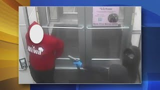 CAUGHT ON VIDEO Video shows suspect point gun at Wawa employees head during robbery [upl. by Anomis320]