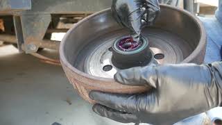 HOW TO repack trailer wheel bearings FAST AND EASY [upl. by Yenahs]