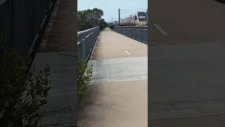 Queensland Rails NGR unit 764 approaches Mango Hill East train station one late September morning [upl. by Oryaj]