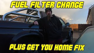 Changing the fuel filter on a Mitsubishi L200 K74  Get you home fix [upl. by Llahsram]