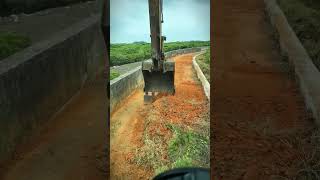 Irrigation ditch soil clearing process [upl. by Ytsenoh]