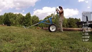 Moving Heavy Logs Logrite Buck Arch unloading Telephone Poles [upl. by Inalel]