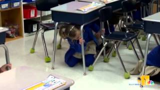 Students practice earthquake safety at school [upl. by Ludlew177]