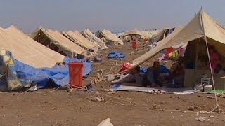 Thousands of Iraqi Yazidis flee to Syria [upl. by Westphal]