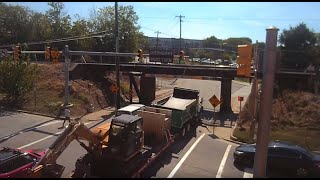 Excavator on trailer quotbitesquot back at the 11foot8 bridge [upl. by Anaiad]