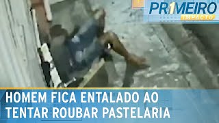 Criminosos tentam assaltar pastelaria e um deles fica preso em portão  Primeiro Impacto 050424 [upl. by Yllaw596]