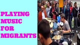 Musician performs for Migrants at Hamburg train station [upl. by Calan]