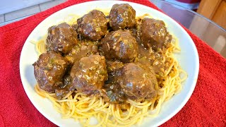 Meatballs smothered in gravy over seasoned spaghetti [upl. by Nayk]