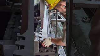 the process of bending metal to the desired shape using a press at a factory [upl. by Nehpets512]