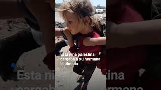 Esta niña palestina cargó durante una hora a su hermana lastimada [upl. by Olathe754]