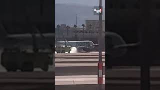 Frontier Airlines plane catches fire while landing at Las Vegas airport [upl. by Aleta]