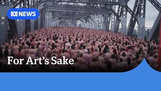 Thousands of naked people descend on Brisbanes Story Bridge for Spencer Tunicks art  ABC News [upl. by Idaf]