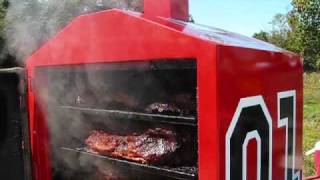 BBQ Smoker loaded with 18 full sized beef briskets Cooking with Wine and the BBQ Vault [upl. by Garfield]