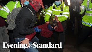 Arrests as police clash with protesters at Sarah Everard vigil in Clapham Common [upl. by Lewls]