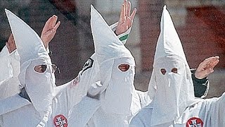 Man In KKK Hood Kicked Out Of LA City Meeting Wins Settlement [upl. by Adnolrehs]