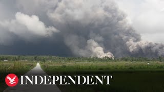 Indonesia Mount Semeru volcano eruption spews ash 50000ft into the sky [upl. by Violante]