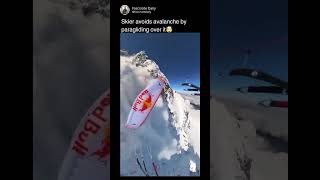 Skier avoids avalanche by paragliding over it [upl. by Odlanor]