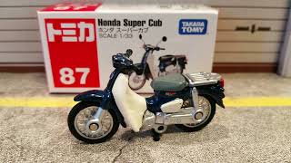 Honda Super Cub made by Takara Tomy in scale 133 diecast motorcycle [upl. by Nyrek]