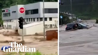 Slovenia vehicles swept away and people trapped in severe flash flooding [upl. by Ellegna]