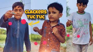 Clackers TUC TUC Game  how to play clackers tak tak  Clackers toy ball  1970s Clackers [upl. by Eiliak]