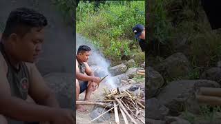 Making a fire while camping camping bushcraft survival camp campinglife campingheavyrain [upl. by Lejna]