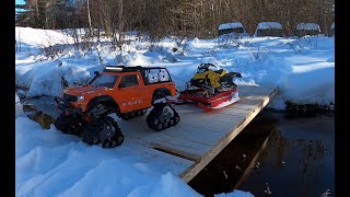 SKIDOO rc snowmobile LONG TRACKadventureJUMPINGtraxxas trx4 traxx deep terrain adventureon snow [upl. by Meil]