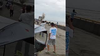 Surging Qiantang River tide narrowly misses spectators in China  Viral Video UK [upl. by Campy]