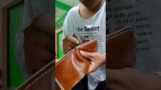 Sanding a bifold wallet handmade bifoldwallet leathercraft leather [upl. by Wolfram]