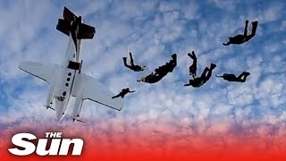 Stalling plane nosedives amp nearly hits skydivers [upl. by Tammany329]