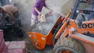 Concrete mixer Kovaco ML 300 on a Locust L 903 skid steer loader [upl. by Eidoj]