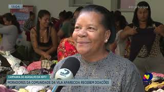 Moradores da comunidade da Vila Aparecida recebem doações da Campanha do Agasalho [upl. by Bronnie543]