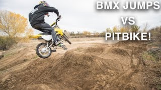 HITTING BMX JUMPS ON A PIT BIKE [upl. by Ameluz988]