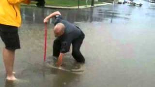 RAW VIDEO Hockey Stick Used To Clear Storm Drain [upl. by Eel]