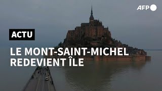 Le MontSaintMichel devient une île avec les grandes marées  AFP [upl. by Aiela]