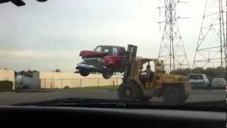 Heavy duty forklift lifting ford truck [upl. by Serdna563]