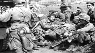 US soldiers and German prisoners eat food in UnterDiessen Germany during World HD Stock Footage [upl. by Rovert706]