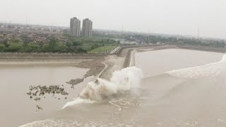 Worlds Largest Tidal Bore Forms in Chinas Qiantang River [upl. by Kasevich]