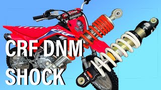 CRF110 SUSPENSION UPGRADE HOW TO INSTALL DNM SHOCK [upl. by Irap]