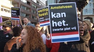 Tientallen actievoerders demonstreren tegen Zwarte Piet op Stadsplein [upl. by Snyder994]