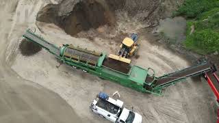 McCloskey 621RE Trommel Screener and Screencore 4100 Stacker  Screening and Stacking Black Dirt [upl. by Andri]