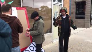 Former Pangea Piercing owner confronts Ann Arbor protesters [upl. by Anetsirhc]