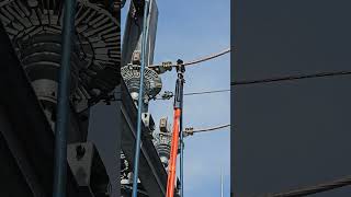 Grounding a high voltage wire with induction substation electrical maintenance [upl. by Millham]