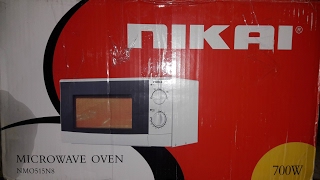 unboxing NIKAI MICROWAVE OVEN 700W FINAL FIND 720p HD [upl. by Orran45]