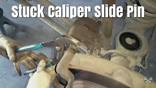 Here Is How To Remove A Stuck Caliper Slide Pin [upl. by Star]